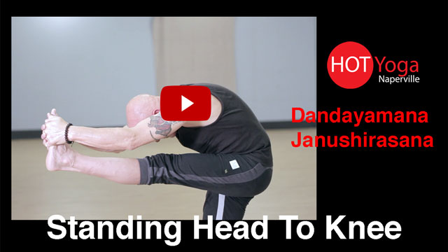 Standing head to knee pose Cut Out Stock Images & Pictures - Alamy
